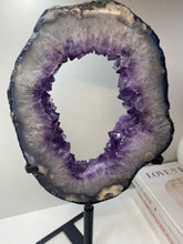 Load image into Gallery viewer, Amethyst Crystal geode slice on black display stand