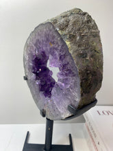 Load image into Gallery viewer, Amethyst Crystal geode slice on black display stand