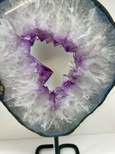 Load image into Gallery viewer, Amethyst Crystal geode slice on black display stand
