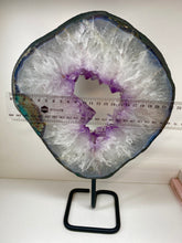 Load image into Gallery viewer, Amethyst Crystal geode slice on black display stand