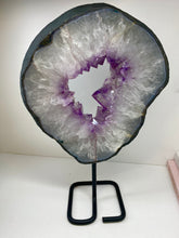 Load image into Gallery viewer, Amethyst Crystal geode slice on black display stand
