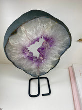 Load image into Gallery viewer, Amethyst Crystal geode slice on black display stand