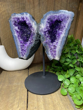 Load image into Gallery viewer, Amethyst Crystal geode wings on black display stand
