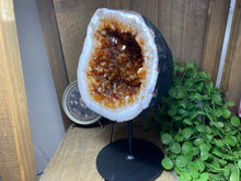 Load image into Gallery viewer, Large Citrine cave on black stand