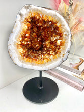 Load image into Gallery viewer, Large Citrine cave on black stand