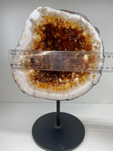Load image into Gallery viewer, Large Citrine cave on black stand