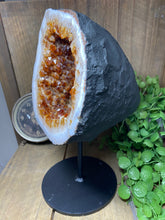 Load image into Gallery viewer, Large Citrine cave on black stand