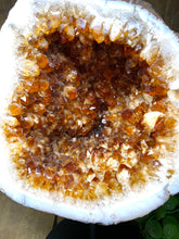 Load image into Gallery viewer, Large Citrine cave on black stand