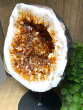 Load image into Gallery viewer, Large Citrine cave on black stand