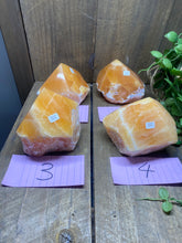 Load image into Gallery viewer, Orange Calcite semi polished points