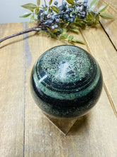 Load image into Gallery viewer, Green Hair Jasper sphere on stand