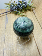 Load image into Gallery viewer, Polished Green Hair Jasper sphere on stand