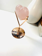 Load image into Gallery viewer, Polished Rose Quartz love heart on rose colored metal stand with zodiac sign