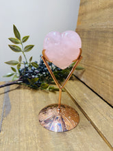 Load image into Gallery viewer, Polished Rose Quartz love heart on rose colored metal stand with zodiac sign