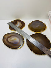 Load image into Gallery viewer, Natural polished Agate Slice drink coasters with Gold Electroplating - Set of 4