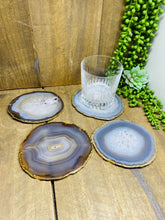 Load image into Gallery viewer, Natural polished Agate Slice drink coasters with Gold Electroplating - Set of 4