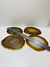 Load image into Gallery viewer, Natural polished Agate Slice drink coasters with Gold Electroplating - Set of 4