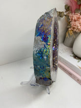 Load image into Gallery viewer, Titanian coated Amethyst Crystal geode slice on display stand
