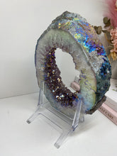 Load image into Gallery viewer, Titanian coated Amethyst Crystal geode slice on display stand