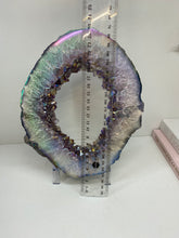 Load image into Gallery viewer, Titanian coated Amethyst Crystal geode slice on display stand