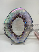 Load image into Gallery viewer, Titanian coated Amethyst Crystal geode slice on display stand