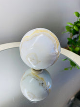 Load image into Gallery viewer, White, cream and orange Onyx sphere