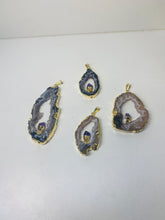 Load image into Gallery viewer, Natural Agate Geode pendant with Gold Electroplating around the edges and Amethyst point in the middle - necklace