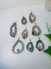 Load image into Gallery viewer, Natural Agate Geode pendant with Gold Electroplating around the edges and Amethyst point in the middle - necklace