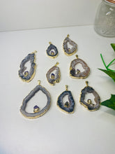 Load image into Gallery viewer, Natural Agate Geode pendant with Gold Electroplating around the edges and Amethyst point in the middle - necklace