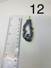 Load image into Gallery viewer, Natural Agate Geode pendant with Gold Electroplating around the edges and Amethyst point in the middle - necklace