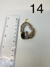 Load image into Gallery viewer, Natural Agate Geode pendant with Gold Electroplating around the edges and Amethyst point in the middle - necklace