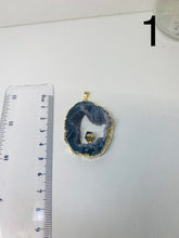 Load image into Gallery viewer, Natural Agate Geode pendant with Gold Electroplating around the edges and Amethyst point in the middle - necklace