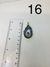 Load image into Gallery viewer, Natural Agate Geode pendant with Gold Electroplating around the edges and Amethyst point in the middle - necklace