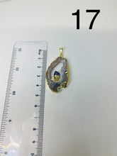 Load image into Gallery viewer, Natural Agate Geode pendant with Gold Electroplating around the edges and Amethyst point in the middle - necklace