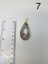 Load image into Gallery viewer, Natural Agate Geode pendant with Gold Electroplating around the edges and Amethyst point in the middle - necklace