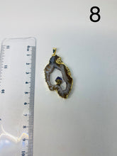 Load image into Gallery viewer, Natural Agate Geode pendant with Gold Electroplating around the edges and Amethyst point in the middle - necklace