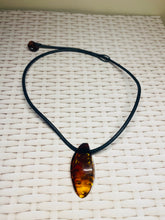 Load image into Gallery viewer, Amber pendant on leather - necklace