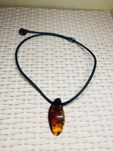 Load image into Gallery viewer, Amber pendant on leather - necklace