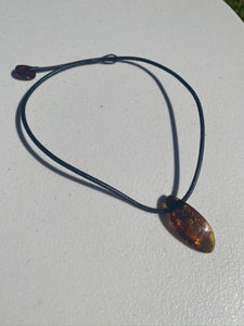 Amber necklace and pendant on leather - necklace