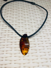 Load image into Gallery viewer, Amber pendant on leather - necklace