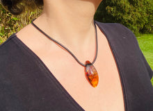 Load image into Gallery viewer, Amber pendant on leather - necklace