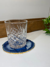 Load image into Gallery viewer, Blue polished Agate Slice drink coaster with Gold Electroplating around the edges