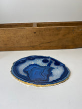 Load image into Gallery viewer, Blue polished Agate Slice drink coaster with Gold Electroplating around the edges