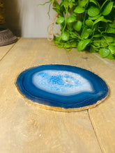 Load image into Gallery viewer, Blue polished Agate Slice drink coaster with Gold Electroplating around the edges