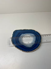 Load image into Gallery viewer, Blue polished Agate Slice drink coaster with silver electroplating around the edges