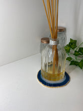 Load image into Gallery viewer, Blue polished Agate Slice drink coaster with Gold electroplating around the edges