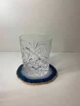 Load image into Gallery viewer, Blue polished Agate Slice drink coaster with Gold electroplating around the edges