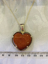 Load image into Gallery viewer, Gold stone heart shaped pendant set in sterling silver