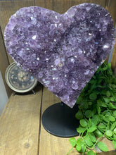 Load image into Gallery viewer, Large Amethyst love heart on black stand