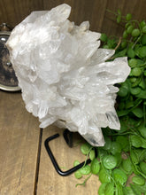 Load image into Gallery viewer, Large clear quartz on black stand